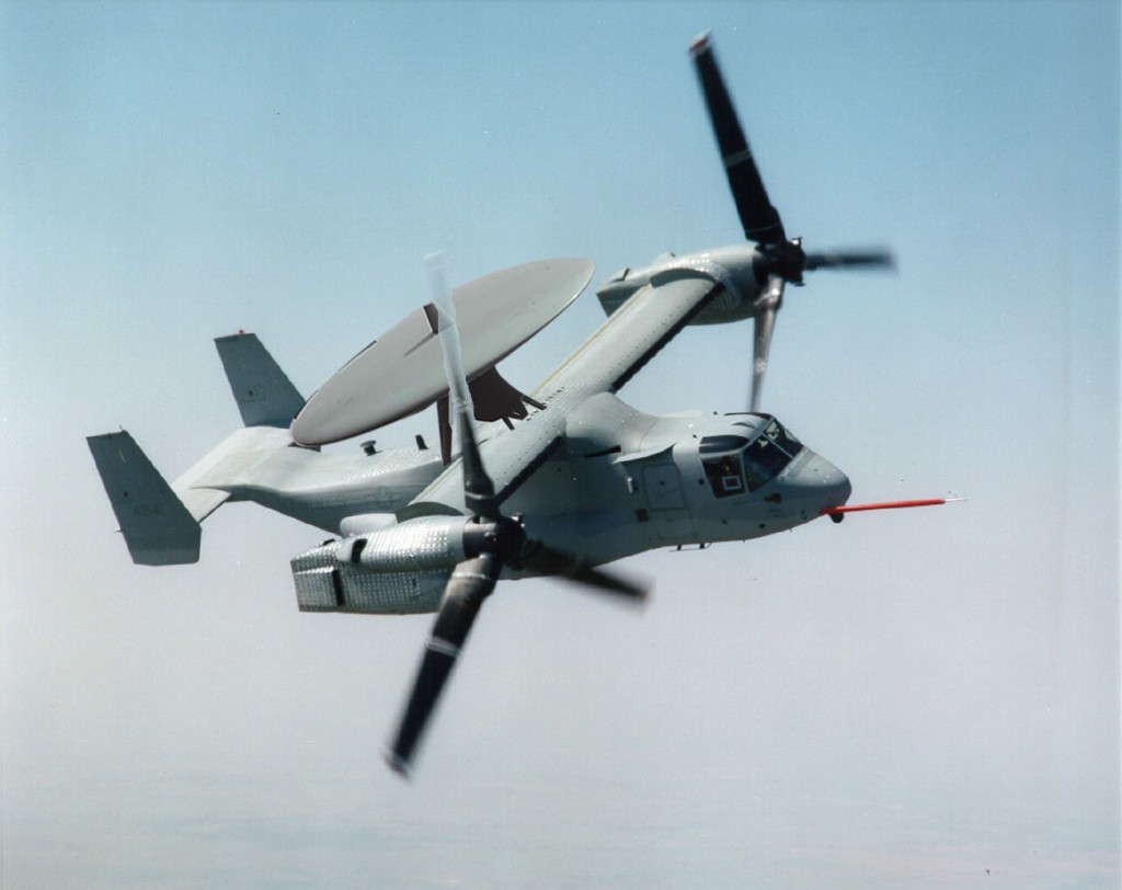 Impresión artística de un MV-22 Osprey con un radar para alerta aérea temprana en la parte superior. 